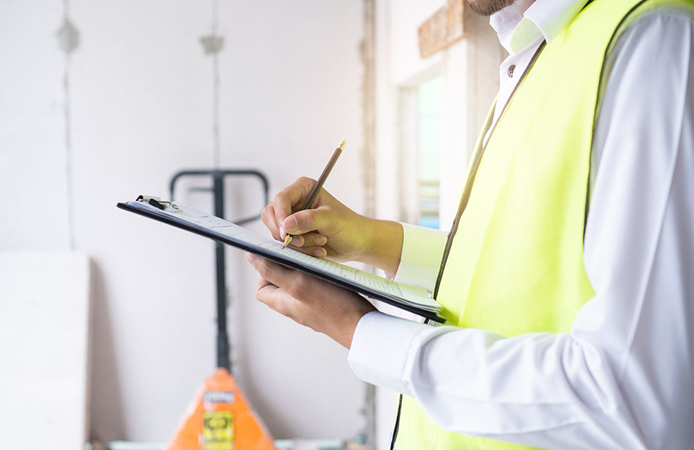 inspectors or engineers are checking the work - California Balcony Inspection Laws