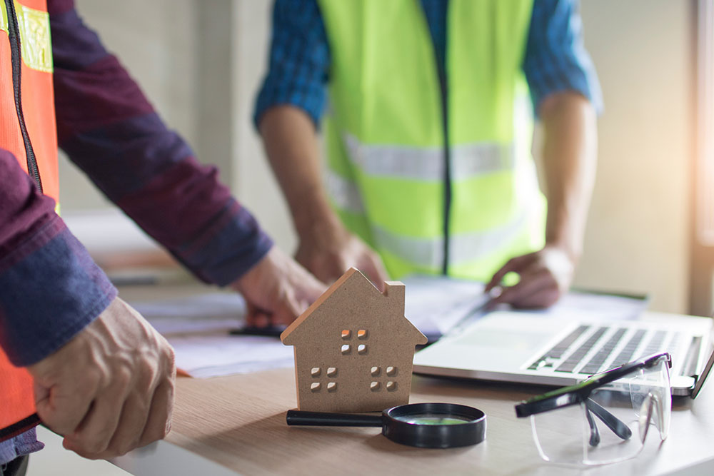 Licensed Inspector or engineer checking house construction