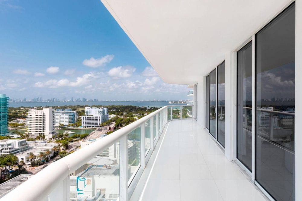 Exterior elevated balcony on a high-rise condominium building with railing and walking surface, representing an exterior elevated element (EEE)